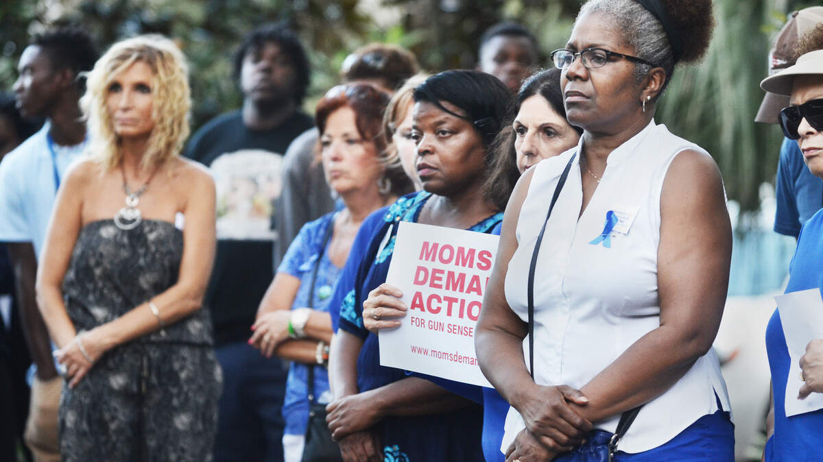 Family and friends of Coligny Park shooting victim Dominique Milton-Williams gather in the park Sept. 10, 2015, to call for an end to gun violence. The gathering was part of the National Day of Action calling attention to the issue.