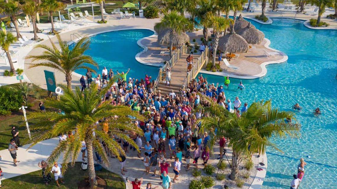 Musician surprises Latitude Margaritaville with poolside concert. Take a guess which one