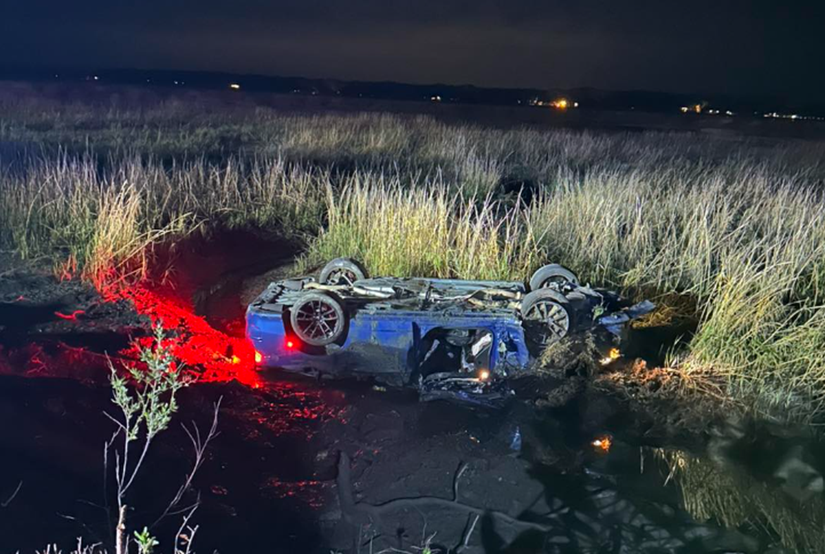 Following a lengthy police chase Sunday morning across Beaufort, a car landed upside down in the pluff mud near in the area of Boundary and Carteret streets. 