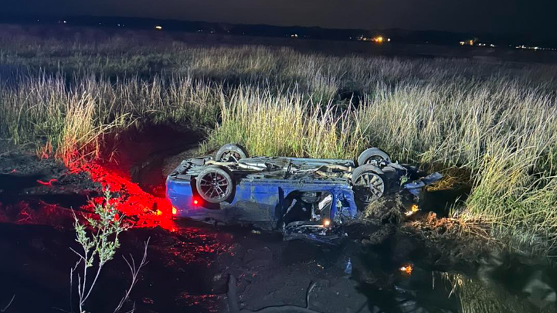 Upside down in the Beaufort marsh: Charger flips after 130 mph street race, police chase