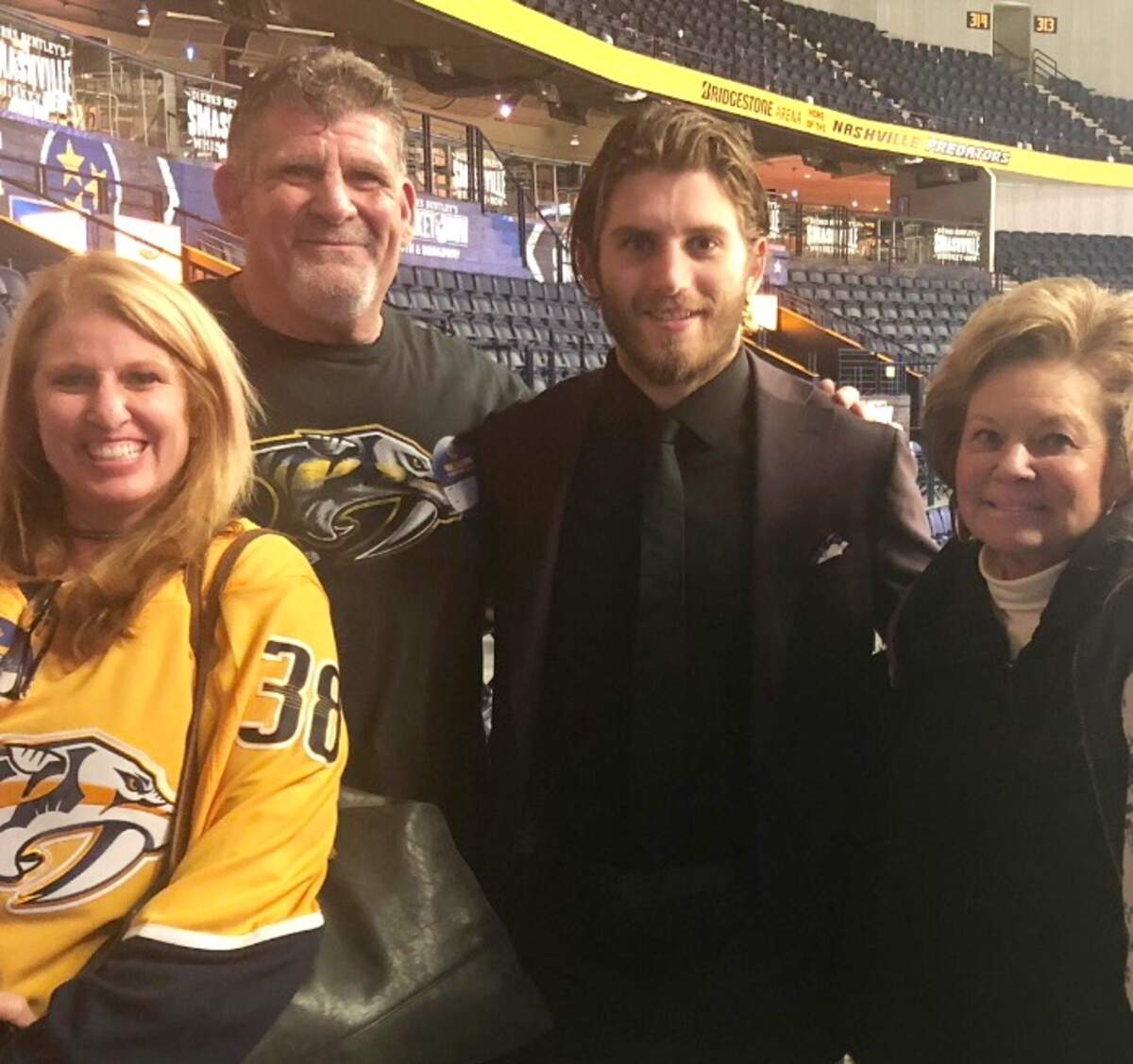 Ryan Hartman in street clothes at the Bridgestone Arena in Nashville, Tenn., where the NHL Predators play, with his aunt and uncle, former Hilton Head Islanders Bill and Karen Baldus Searcey, and his grandmother Kathleen Baldus, also a former islander.