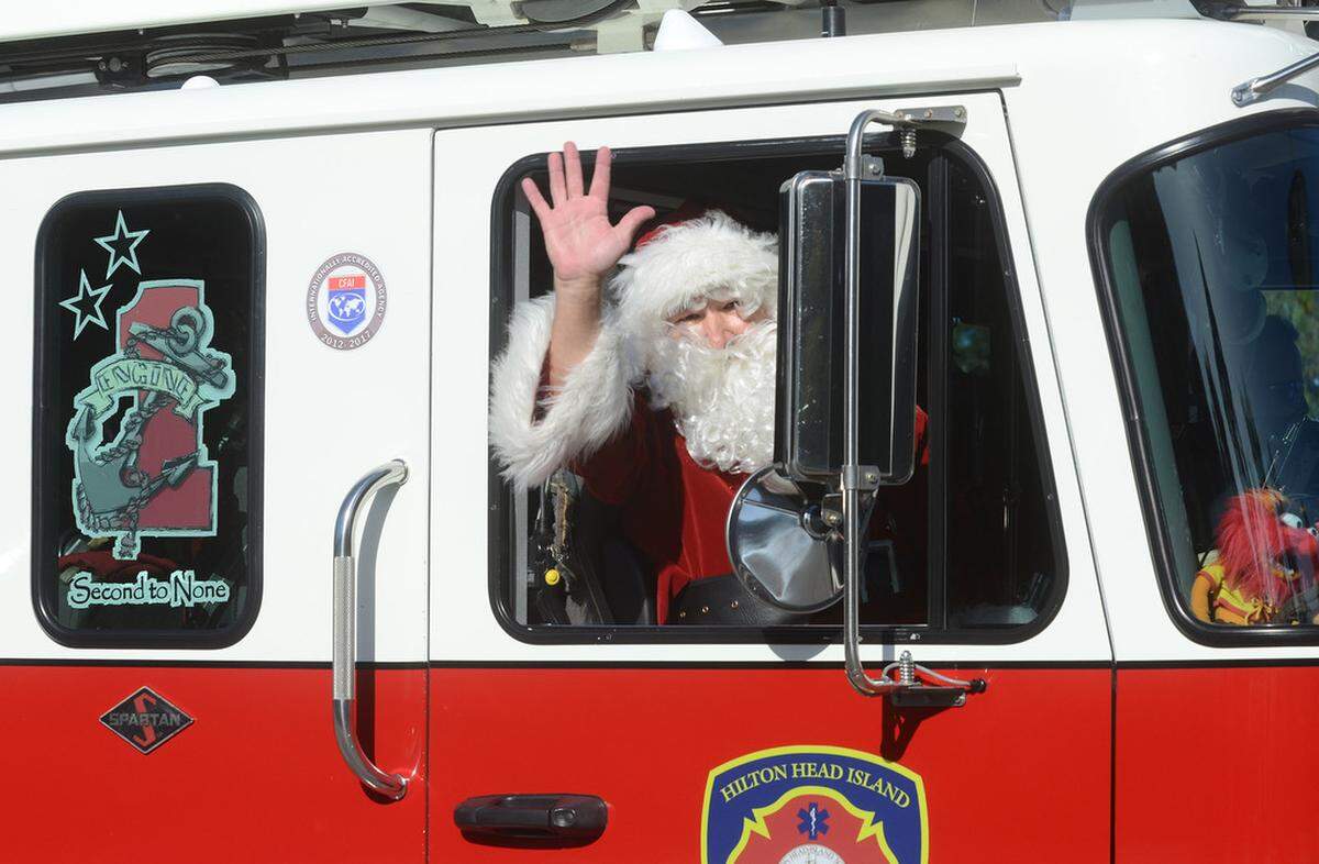 Santa's arrival by helicopter at Coligny Plaza's Local Black Friday outdoor market marked the beginning of the 2015 Christmas season on Hilton Head Island. 