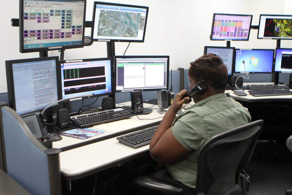 In this file photo, La Shawn Jefferson, Beaufort County communications shift supervisor, sits at one of the call stations in the Beaufort County 911 Dispatch Center in Beaufort.