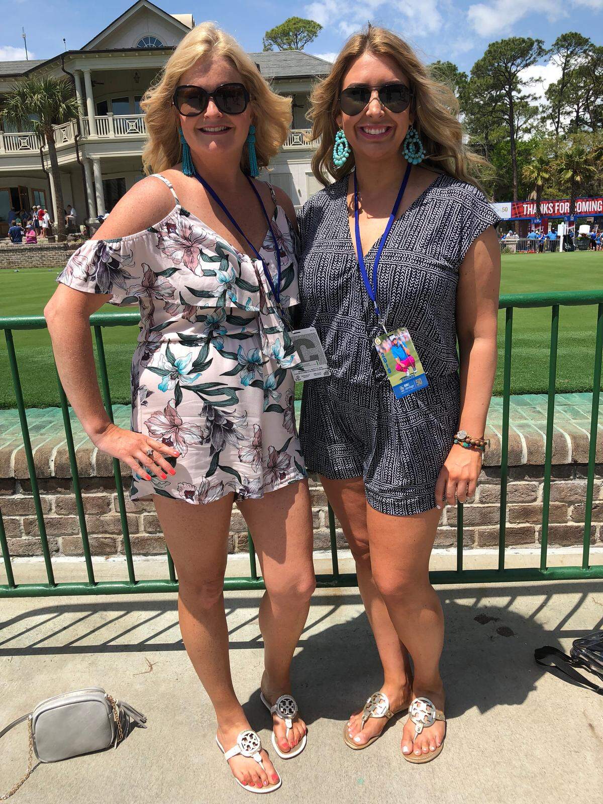 Jenn Gray (L) and Lauren Botto enjoy how rompers can be worn from day to night at the RBC Heritage Golf Tournament on Friday, April 13, 2018.