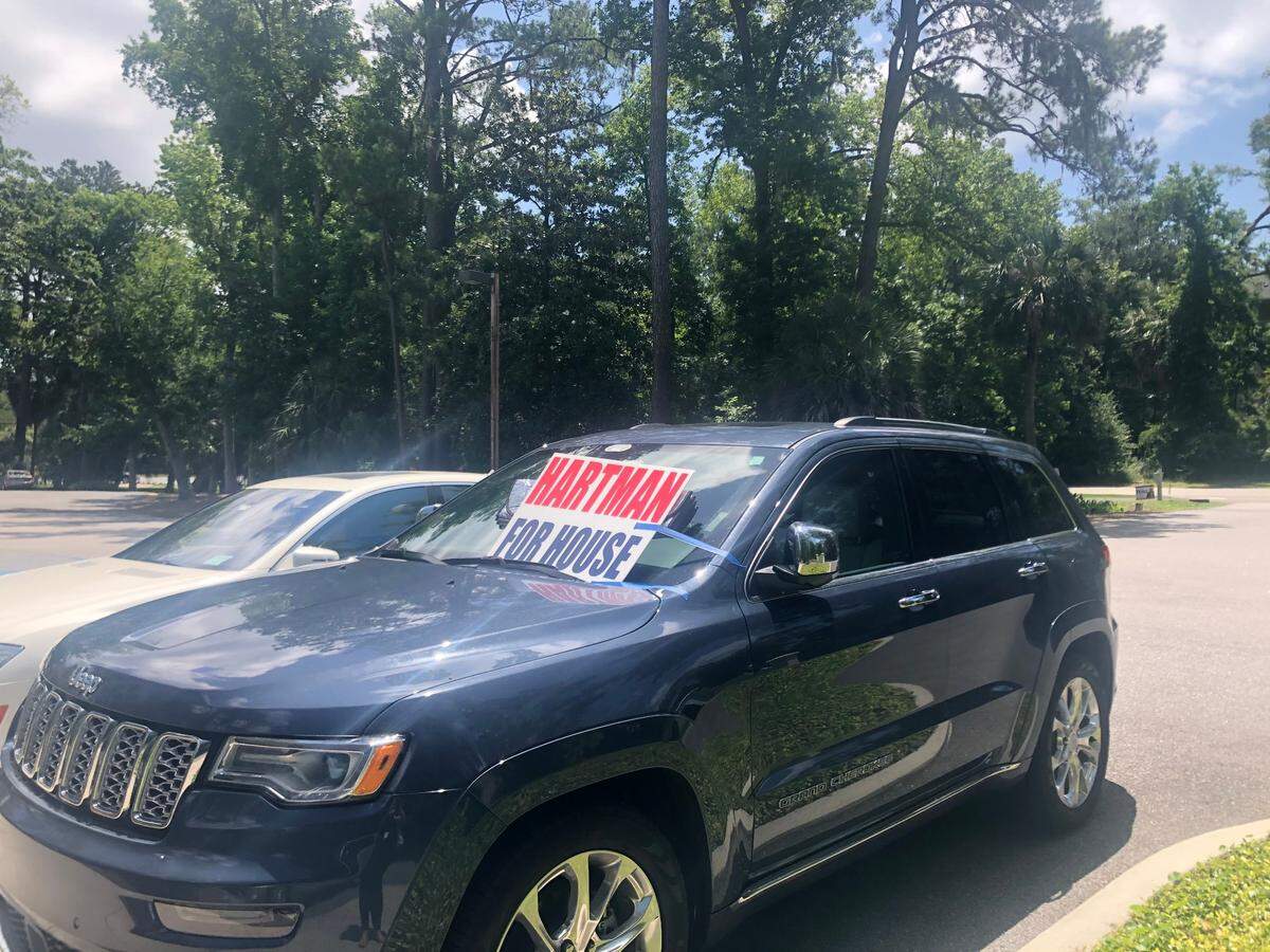 Cars with signs that support Phil Hartman were parked just outside the “no-campaigning” zone at several Hilton Head polling places Tuesday, June 9.