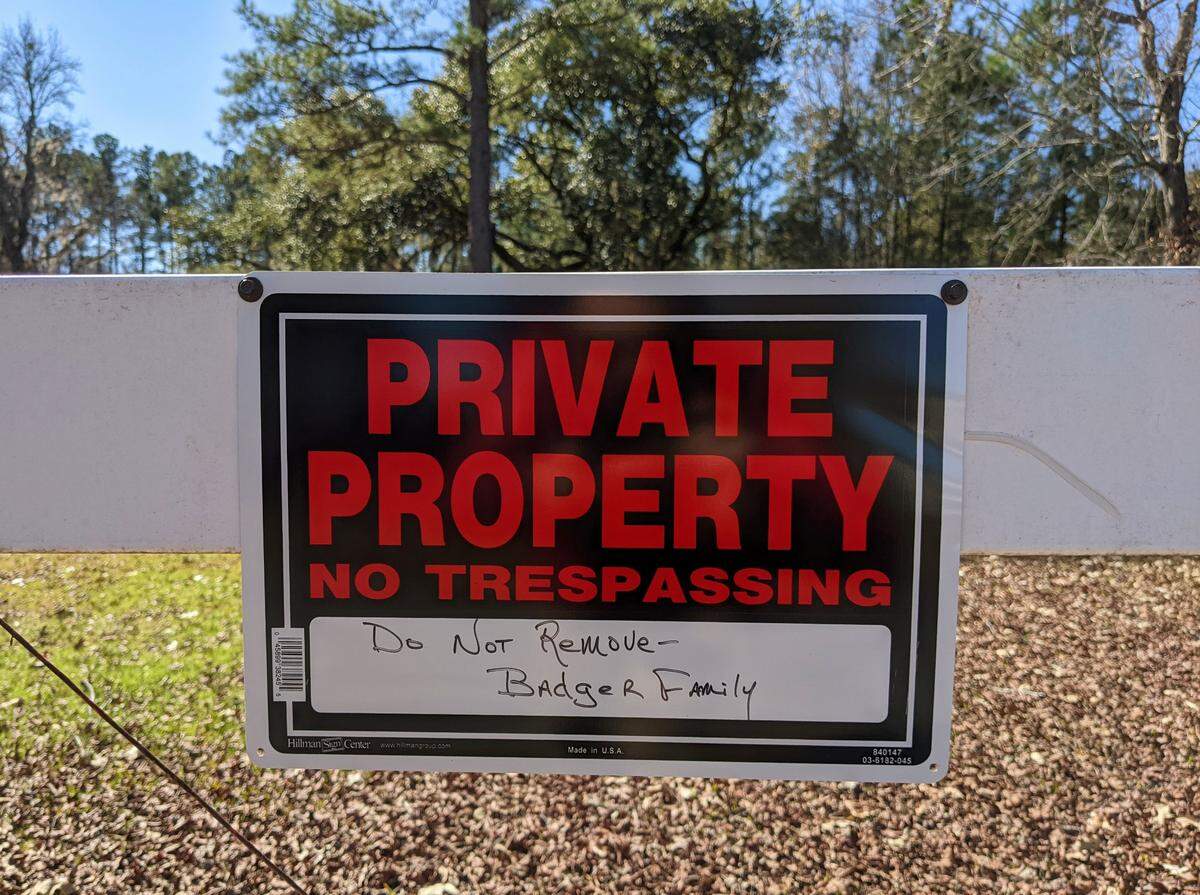 On Jan. 28, 2021, in Scotia, S.C., “no trespassing” signs lined a fence bordering land owned by the Badger family, whose ties to Hampton County go back generations.