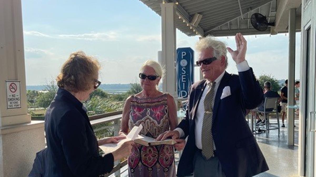 Beaufort County Clerk of Court Jerri Ann Roseneau administers the magistrate’s oath of office to attorney Russ Keep III at the Poseidon seafood restaurant on Hilton Head on May 27, 2021. Keep was nominated to serve as a magistrate judge by Sen. Tom Davis, R-Beaufort, and confirmed by the state Senate.
