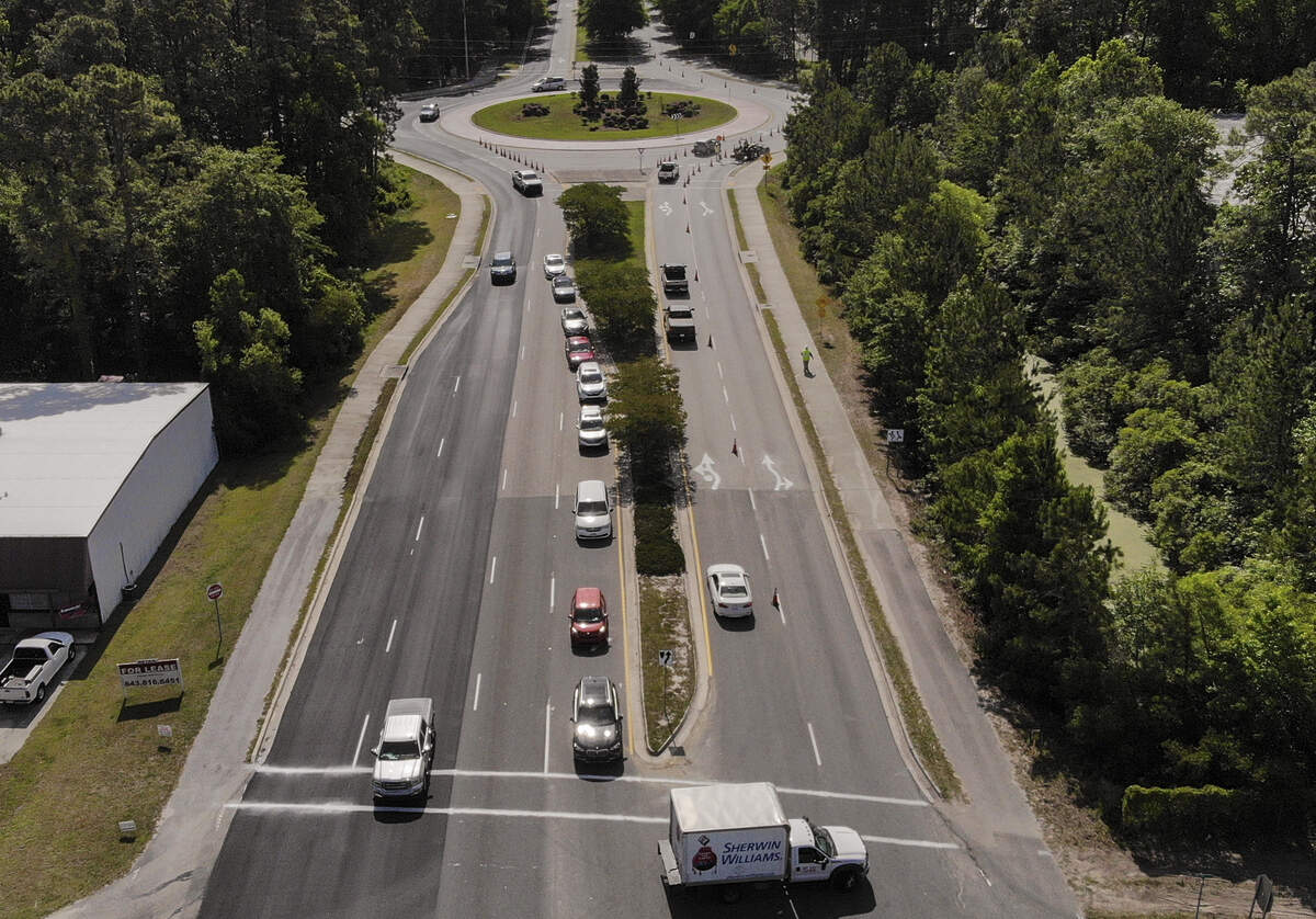 Road paving along Bluffton Parkway and especially at the traffic circle at Bluffton Road has been causing congestion as seen on Tuesday, May 12, 2020. Vehicles, blocked from using the inside lane of the circle, were making u-turns at Goethe Road to double back to complete their journey. Dependent on weather, according to a press release the paving is expected to be completed by the end of the week.