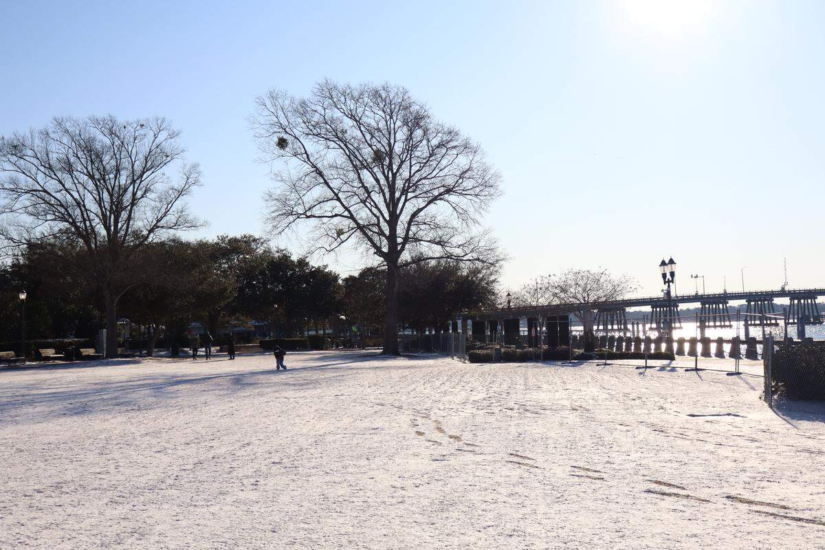 A track of footprints was visible at Beaufort’s downtown waterfront park as a family ventured through the snow the morning of Feb. 1, 2026.
