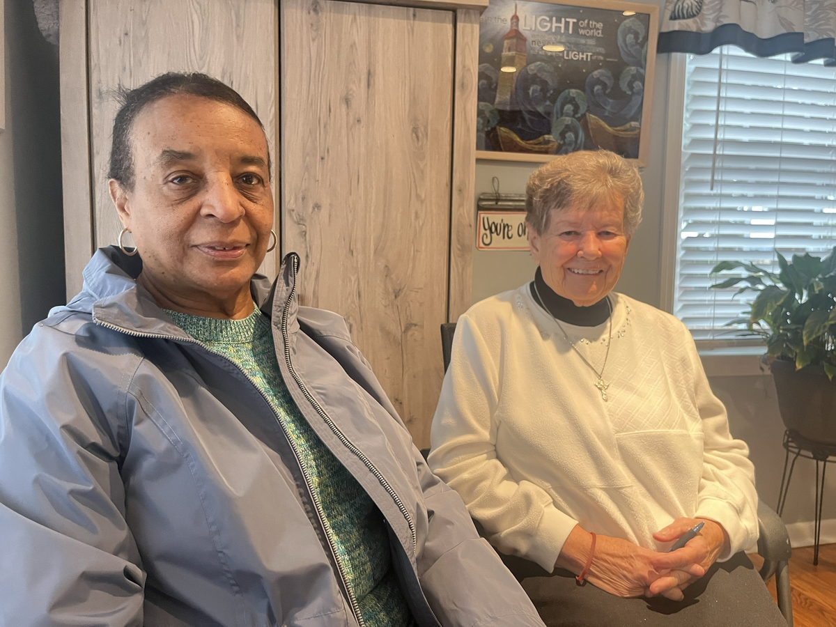 Frankie Middleton, a supporter of St. Francis Center, and Sister Canice, who runs it, assure the public the doors of the charity will remain open despite rumors it was closing after a long-time sign on Sea Island Parkway was removed. “When you feel a calling to help people, you need to help people,” Sister Canice says.