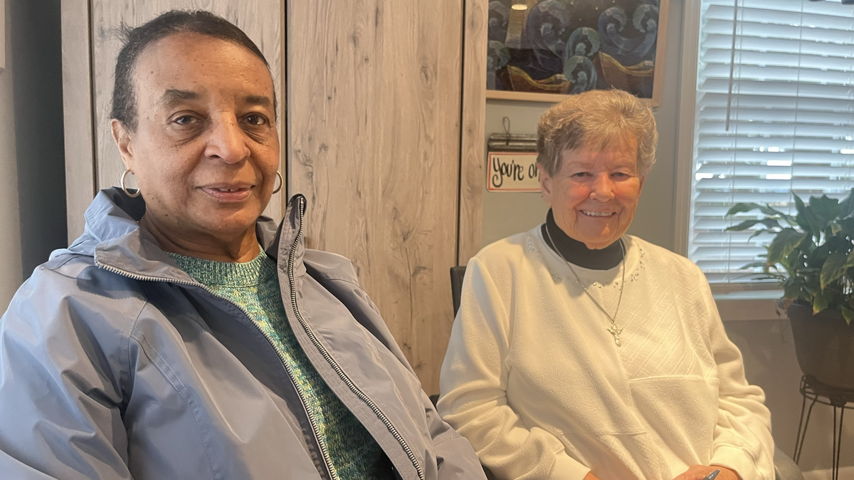 Frankie Middleton, a supporter of St. Francis Center, and Sister Canice, who runs it, assure the public the doors of the charity will remain open despite rumors it was closing after a long-time sign on Sea Island Parkway was removed. “When you feel a calling to help people, you need to help people,” Sister Canice says.