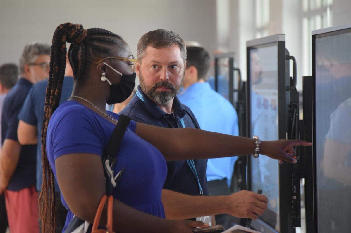 Glorious Mason, of Savannah, points at a screen at the U.S. 278 corridor project public hearing on Hilton Head Island on Thursday, July 22, 2021.