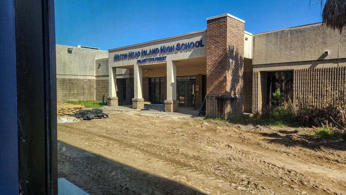 The original Hilton Head Island High School, which will be demolished at the end of this school year, is located behind the new three-story high school as photographed on March 26, 2026, on Hilton Head. 
