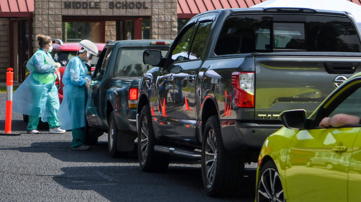 Workers quickly administer free COVID-19 testing in one of two lanes of vehicles on Wednesday, July 15, 2020 at Lady’s Island Middle School. While the morning was busy, Beaufort Memorial Hospital spokesperson Courtney McDermott was surprised the turnout wasn’t greater. The site had the ability to administer 1,500 tests and with 30 minutes till closing, “we’ve probably done half of that,” McDermott said in near 90-degree heat. More free testing is available on Friday at St. Stephen AME Church in Hardeeville, July 22 at Bluffton High School and on July 29 at Battery Creek High School in Beaufort. All with hours of operation from 7 to 11 a.m.