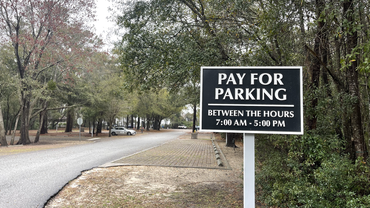 New signs at Fish Haul Beach on Hilton Head Island’s north end Monday show the lot’s hours for paid parking, between 7 a.m. and 5 p.m.
