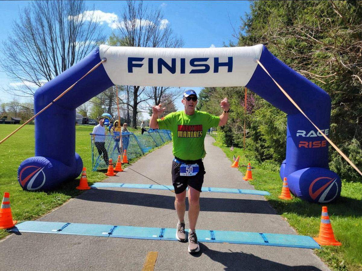 Jay Gibson, a Beaufort resident, finished the Horse Capitol Marathon on April 12, 2025 in Lexington, Kentucky. It marked his 50th and final state to run a marathon.