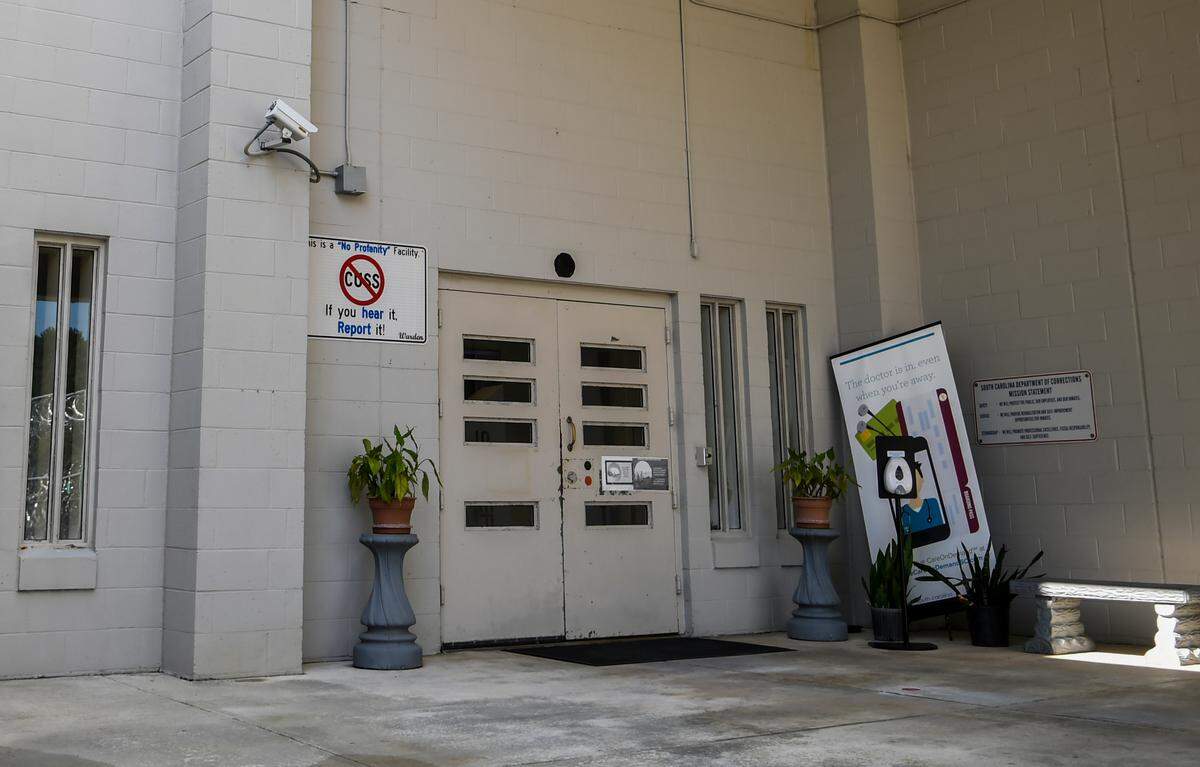 The drab-gray entrance to the S.C. Department of Corrections Ridgeland Correctional Institution as seen on Aug. 6, 2020 located at Exit 22 on Interstate 95 in Ridgeland, S.C. has signage that warns visitors that the prison is a “no profanity facility.”