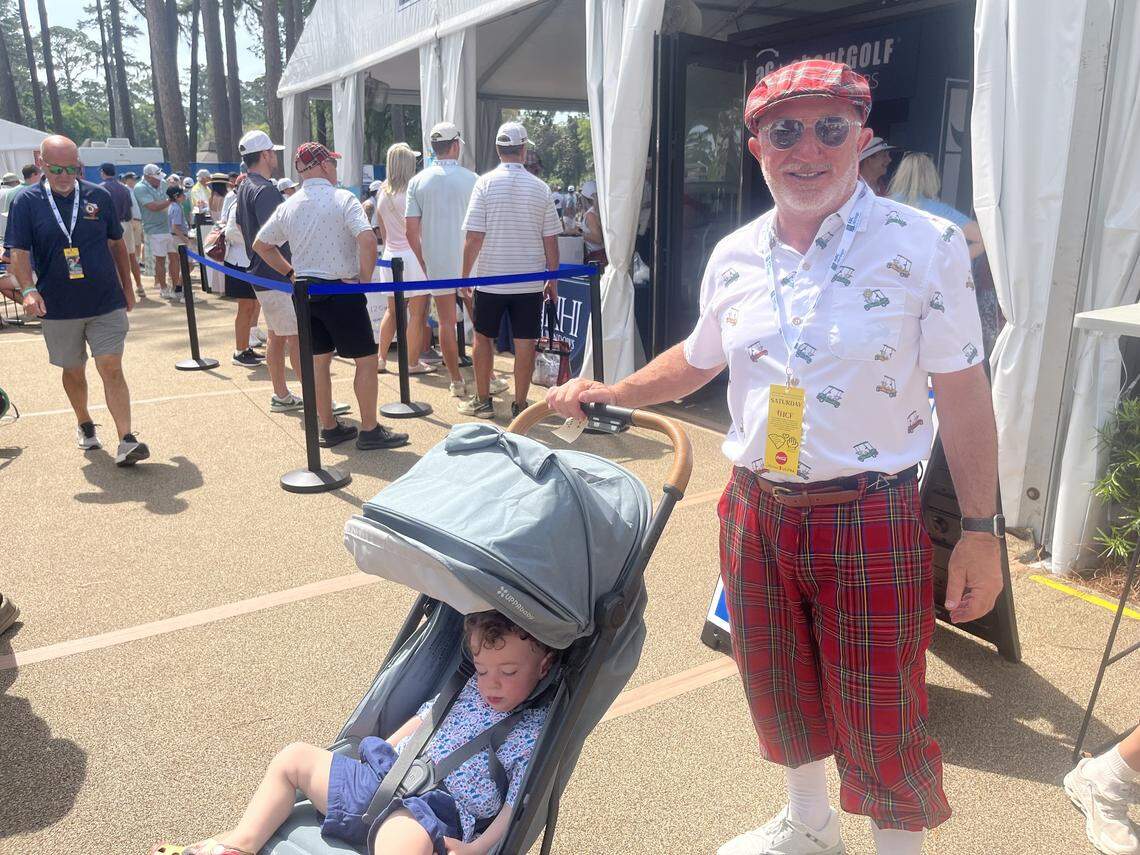 Greg Schupp of Daufuskie Island was dressed to the nines in plaid during Plaid Nation day Saturday at the RBC Heritage. Joining him was Flynn, his 18-month-old grandson.