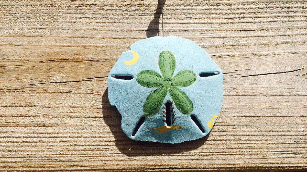 Painting sand dollars is one of first mate Bailey Morris' artistic outlets. 