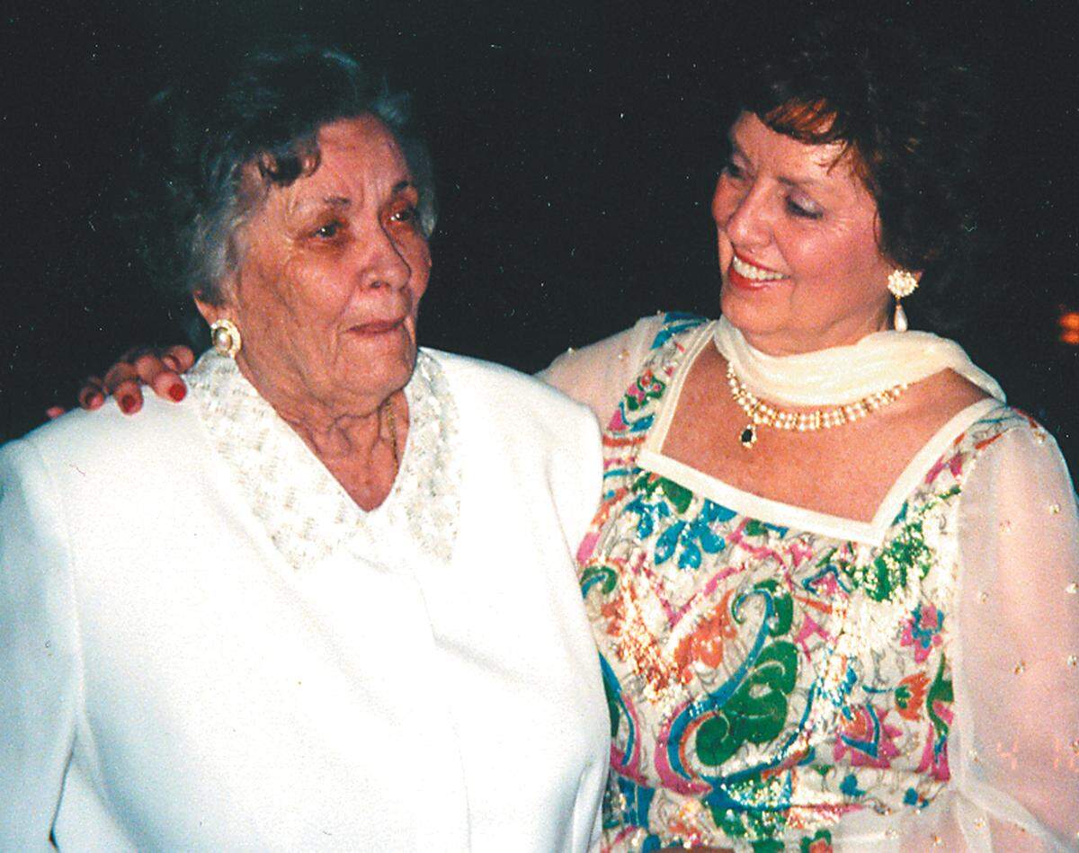 Gertrude Harvey and her daughter attend an awards dinner for Hargray employees in December 1999. Both mother and daughter brought Hargray to life.