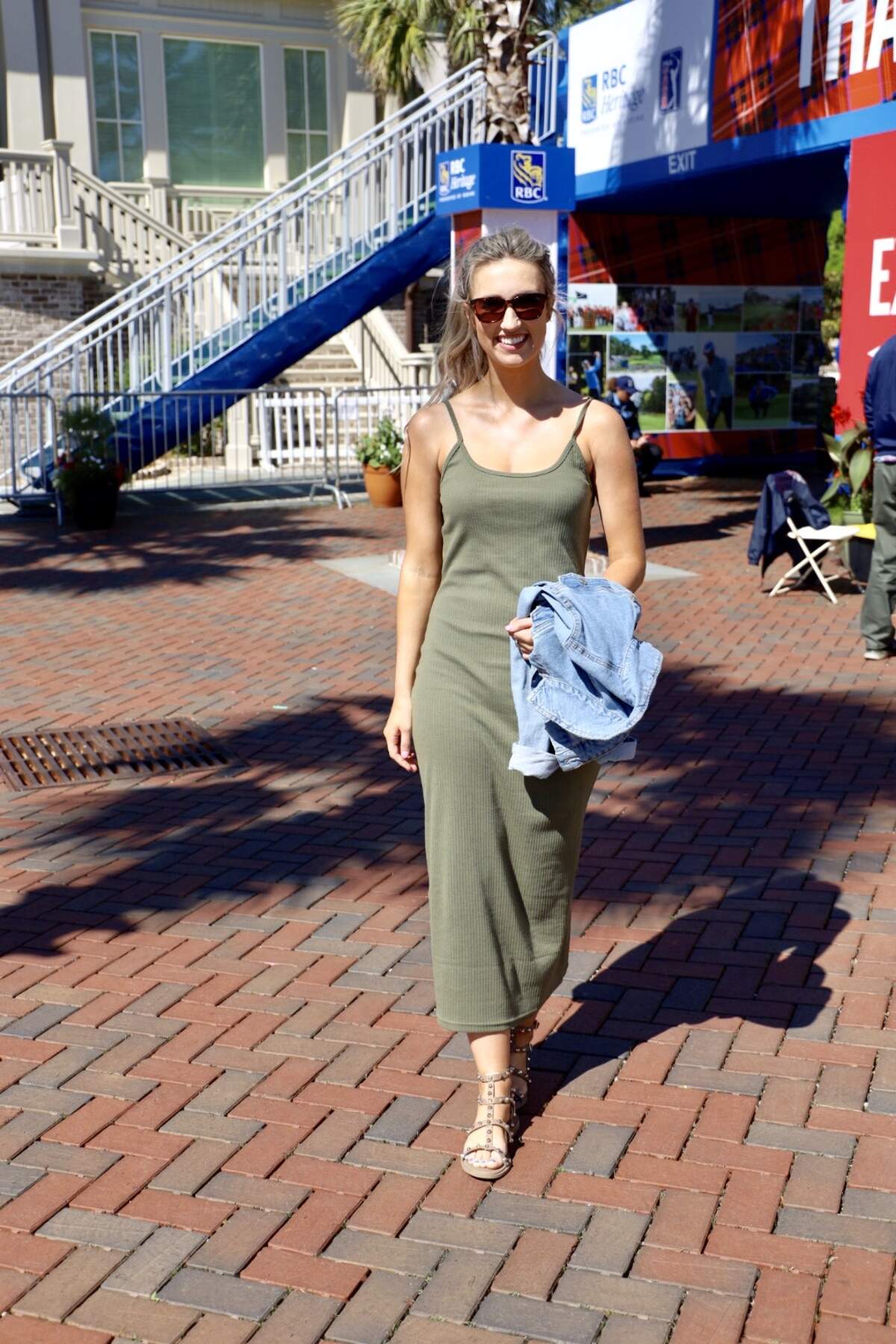 Continuing the trend of green shades for spring style this year, Poppy Miller’s olive colored maxi looked so comfortable. With denim jacket in hand, her outfit is perfect for a day at Heritage.