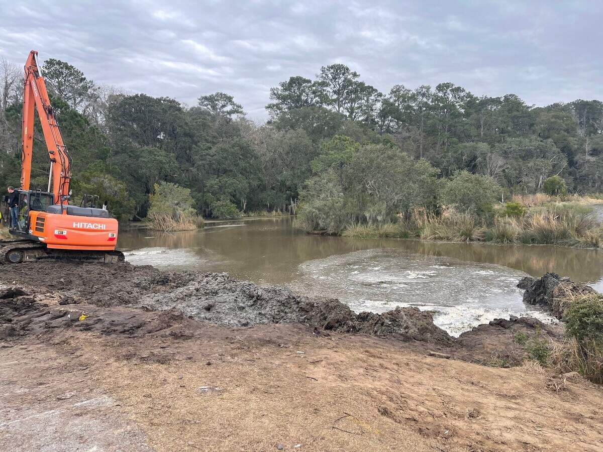 Crews from J.H. Hiers Construction repair a water main break in Bluffton’s Palmetto Bluff community.