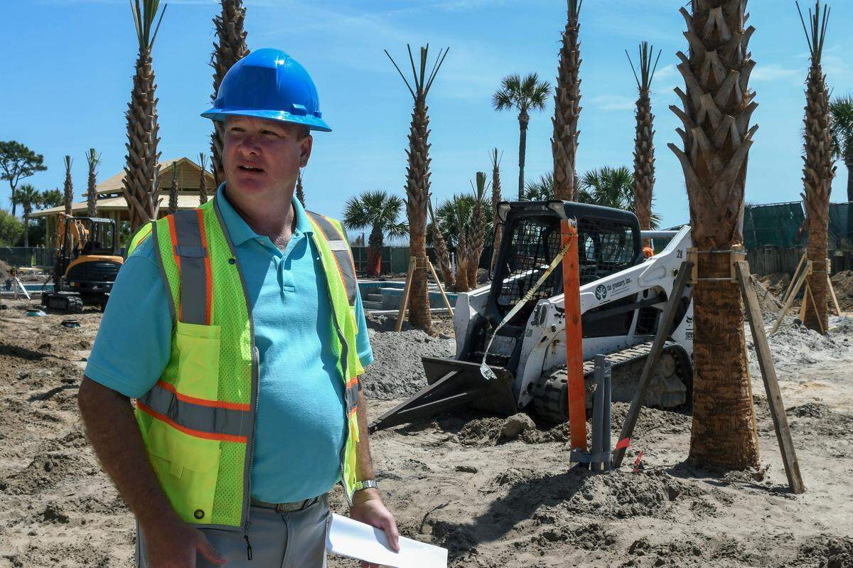 Jay Wiendl, general manager of Beach House Hilton Head Island, explains on Tuesday, April 9, 2024, that wood from the former Tiki Hut will be cut down to coaster sized drink holders and will feature a Tiki Hut logo on the top.