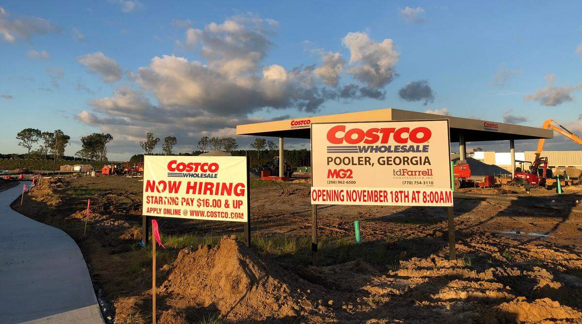 Signs outside the Costco location still under construction in Pooler say the warehouse will open Nov. 18, 2021.