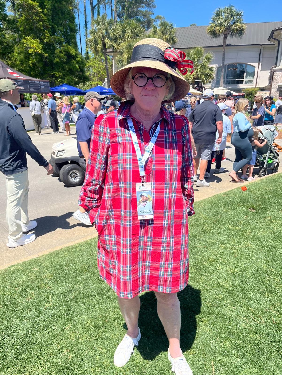 Corinne Magee in her plaid dress and sunhat