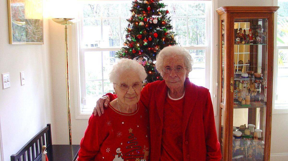 Effie Martin and Aline Moore are pictured at a Christmas party in 2012 at the home of Lynne Dowling on Lady's Island.
