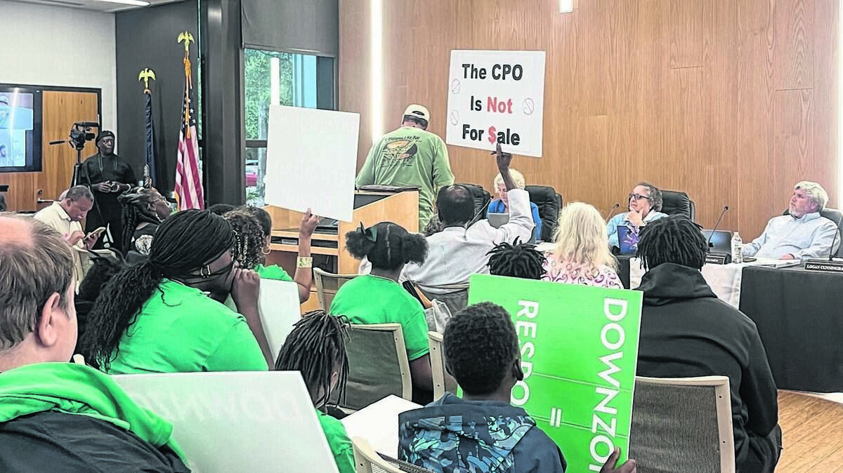 Community members representing both sides of the Pine Island development debate filled the St. Helena library branch for a Beaufort County Council meeting on April 28, 2025.