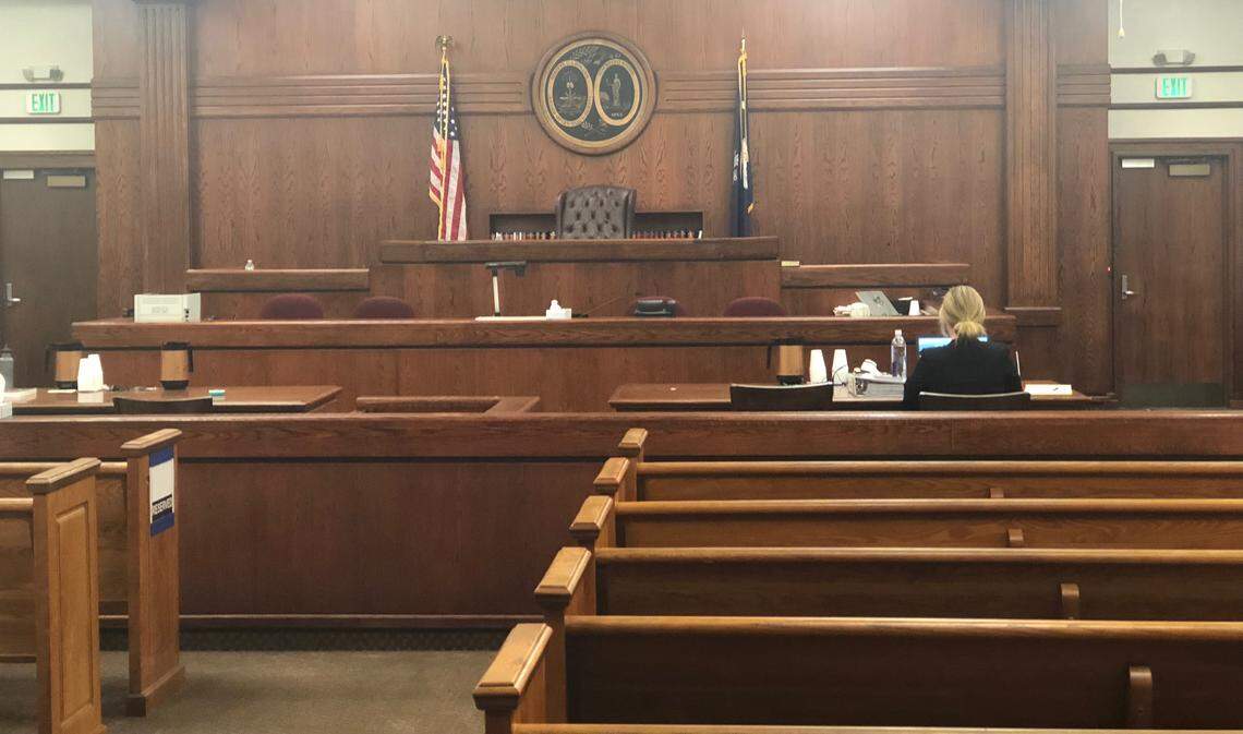 Hunter Swanson, lead prosecutor of the special victims unit of the 14th Circuit Solicitor’s Office, sits alone in the courtroom at the Beaufort County Courthouse on the morning of May 24, 2018, the last day of trial in the Jan. 5, 1980, murder-rape trial of Isaiah Gadson.
