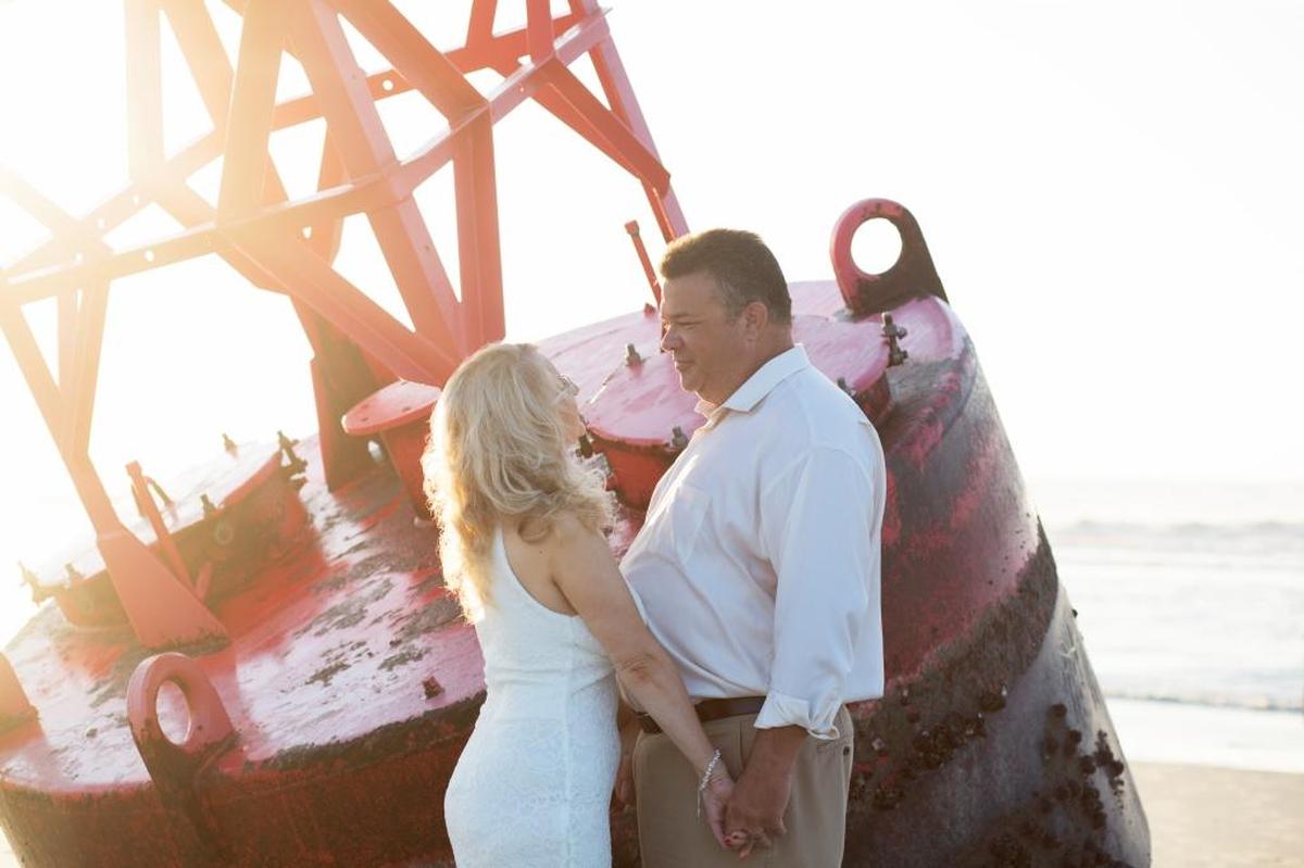 Joel and Ann Marie Jones were married in 2017 on Hilton Head’s Coligny beach. The bride says the buoy that washed ashore from Tropical Storm Irma is one of many signs their wedding was meant to be.