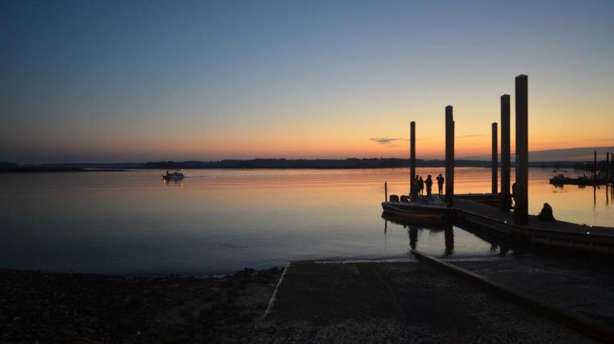 Sunset on the banks of the May River at the Bluffton Oyster Factory Park.