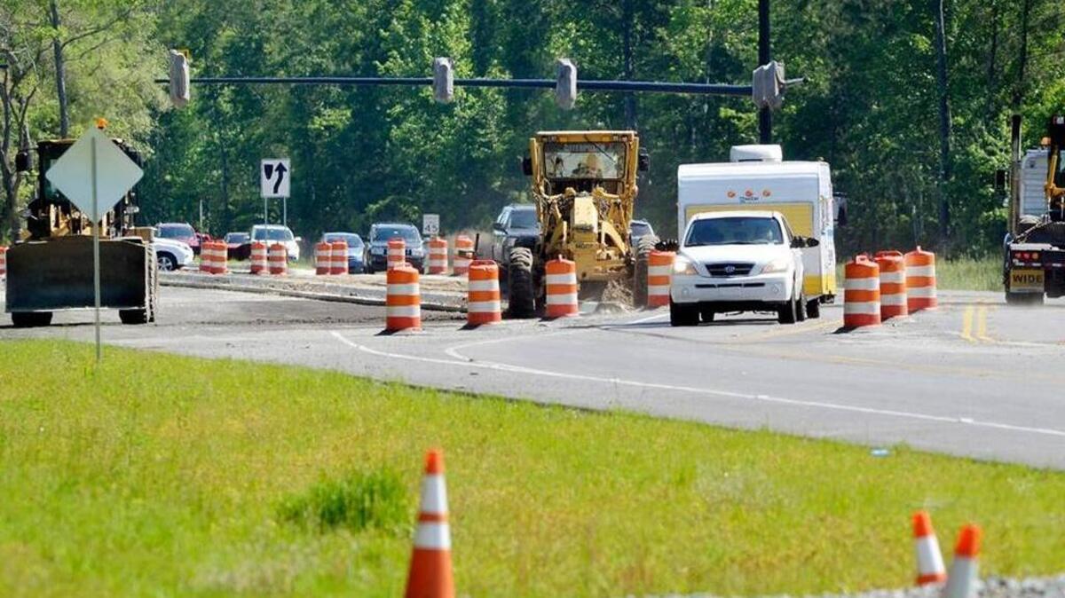 The state has given Okatie-based Cleland Site Prep, Inc. a lowest-in-the-state performance score based on cost overruns and delays on the S.C. 170 widening project. Company owner Avery Cleland disagrees with the ranking and has appealed it. In this April 2014 photo, drivers pick their way through the S.C. 170 construction work near Bluffton Parkway.