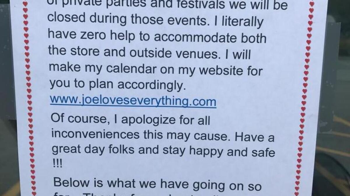 A sign announcing that Joe Loves Lobster Rolls will be closed more than usual during October hangs on the restaurant’s door.