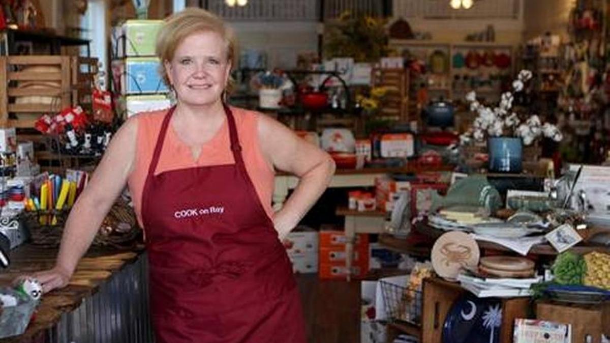 Jodi Campbell, the owner of Cook on Bay, stands in the store in Beaufort.