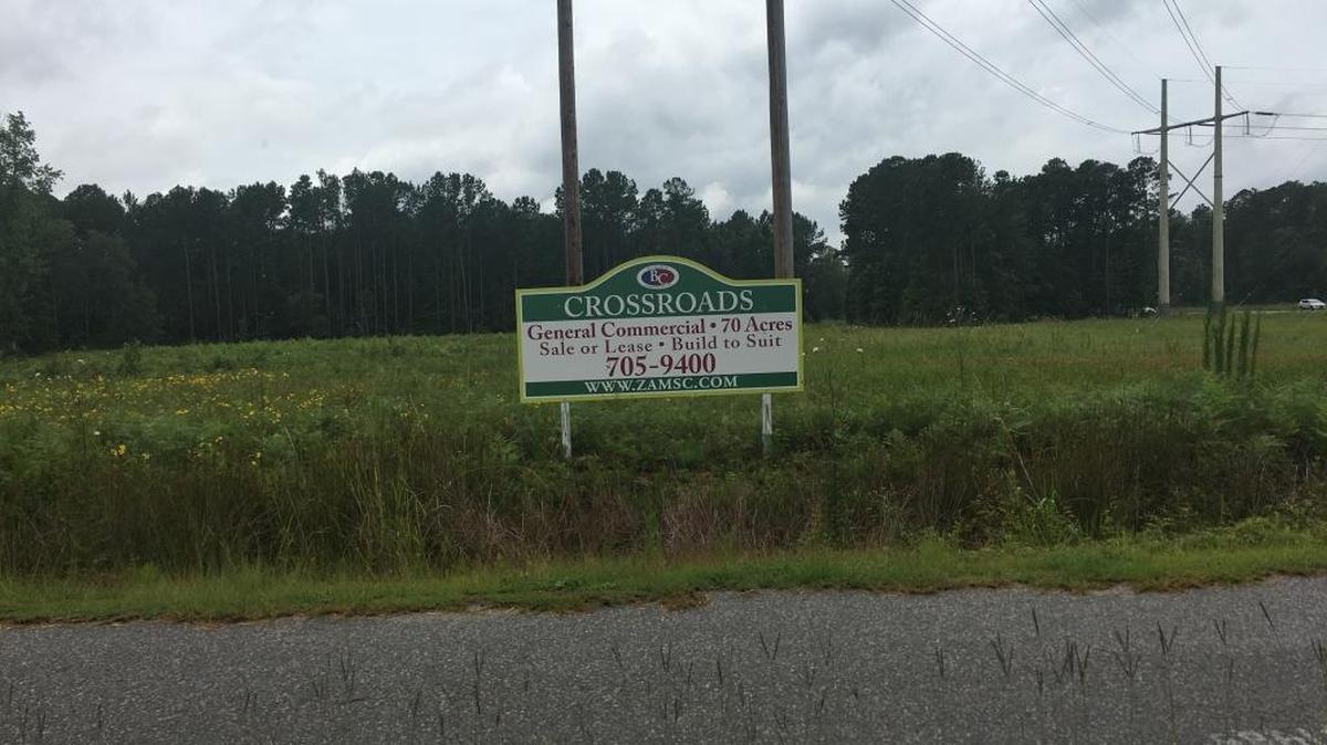 A new sign has been added to a Bluffton property proposed for the future home of Walmart’s Neighborhood Market