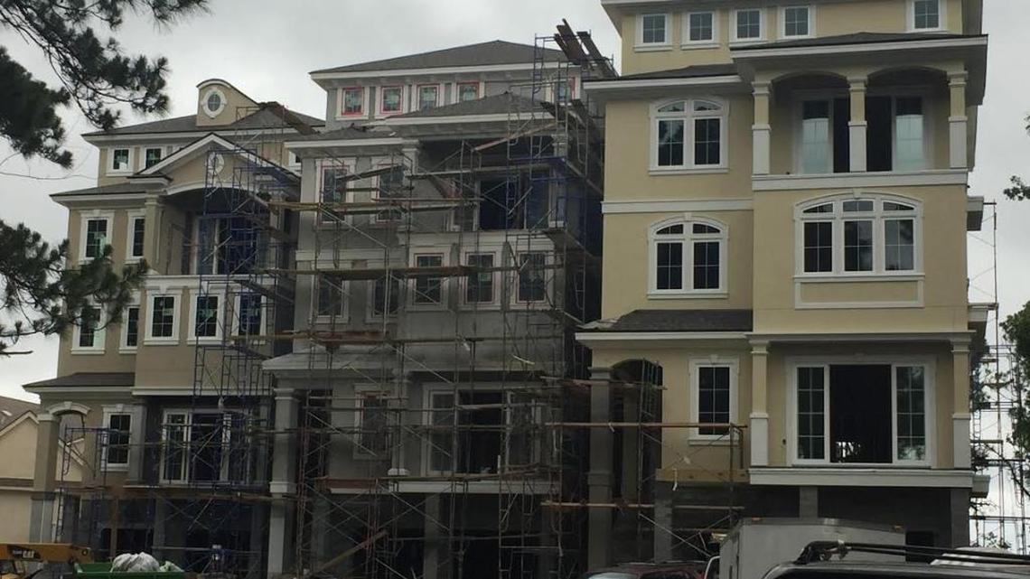 Three resort-style houses on Bradley Circle have generated backlash from neighbors, as seen on June 7, 2017.