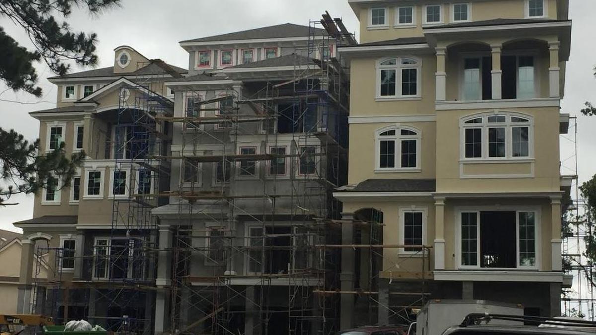 Three resort-style houses on Bradley Circle have generated backlash from neighbors, as seen on June 7, 2017.