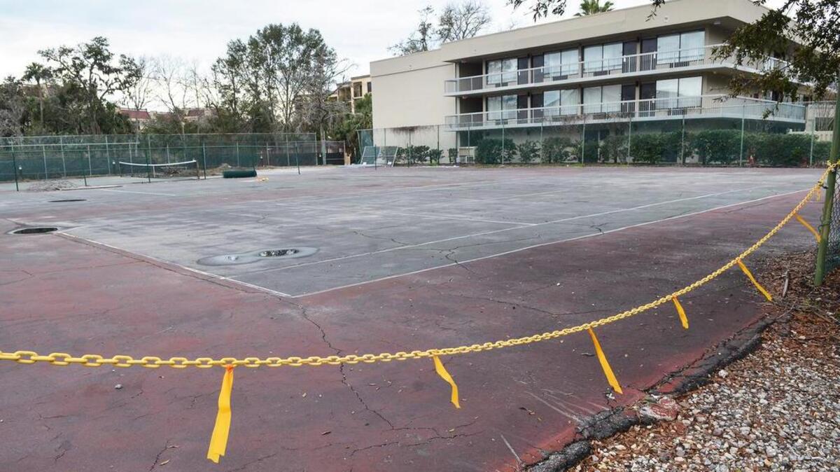 The Oceanwalk tennis courts are photographed on Monday. Claiming that its existing parking has become insufficient during peak vacation season, officials from Oceanwalk, a complex on Hilton Head's Lemoyne Avenue, have met with town staff to discuss turning two of these three unused tennis courts into additional parking spaces.