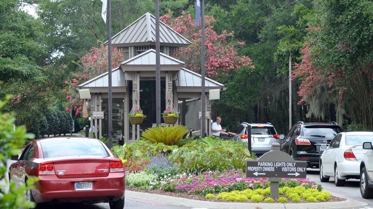 Cars enter Sea Pines at the plantation’s main gate on Greenwood Drive earlier this year.