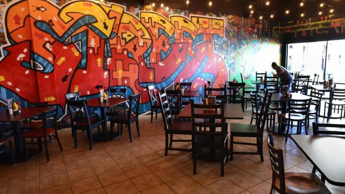 Street Meet’s new 1,000-square-foot expansion is pictured on Thursday. The new dining room opened on Tuesday, and features the same menu and hours but 64 new seats, three televisions and a ’70s, graffiti-ed style.