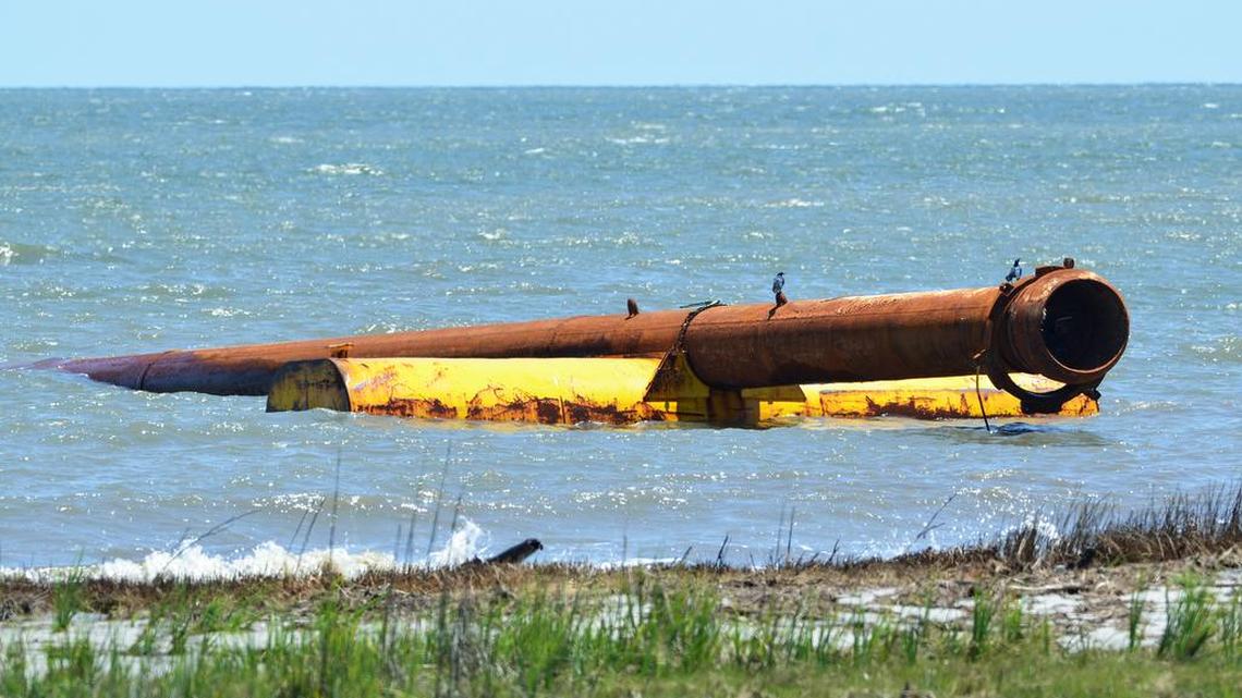 A beach nourishment slurry pipe emerges from the waters of Port Royal Sound at Hilton Head's Mitchelville Beach Park on Thursday. The long-awaited Hilton Head beach nourishment project is slated to begin in that area in the middle of the month.