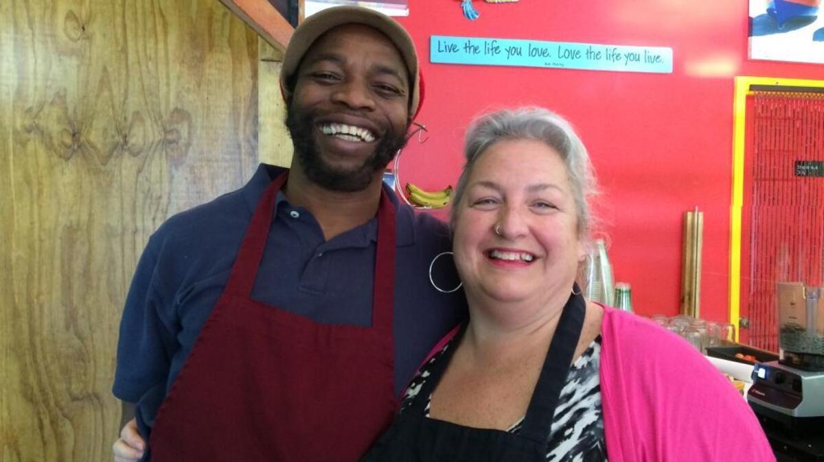 Husband and wife Brinsley Ellis (left) and Tracy Owens bought Pure Natural Market in January 2016 and have expanded the smoothie shop's menu to include vegan and pescatarian food with Jamaican flavor.