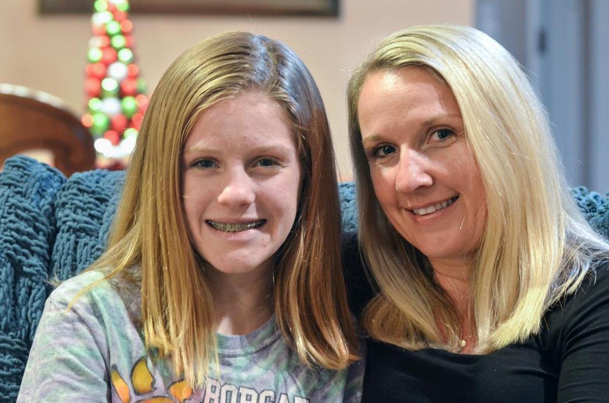 Emma Dewey and her mother, Andrea, are photographed on Dec. 5, 2016.