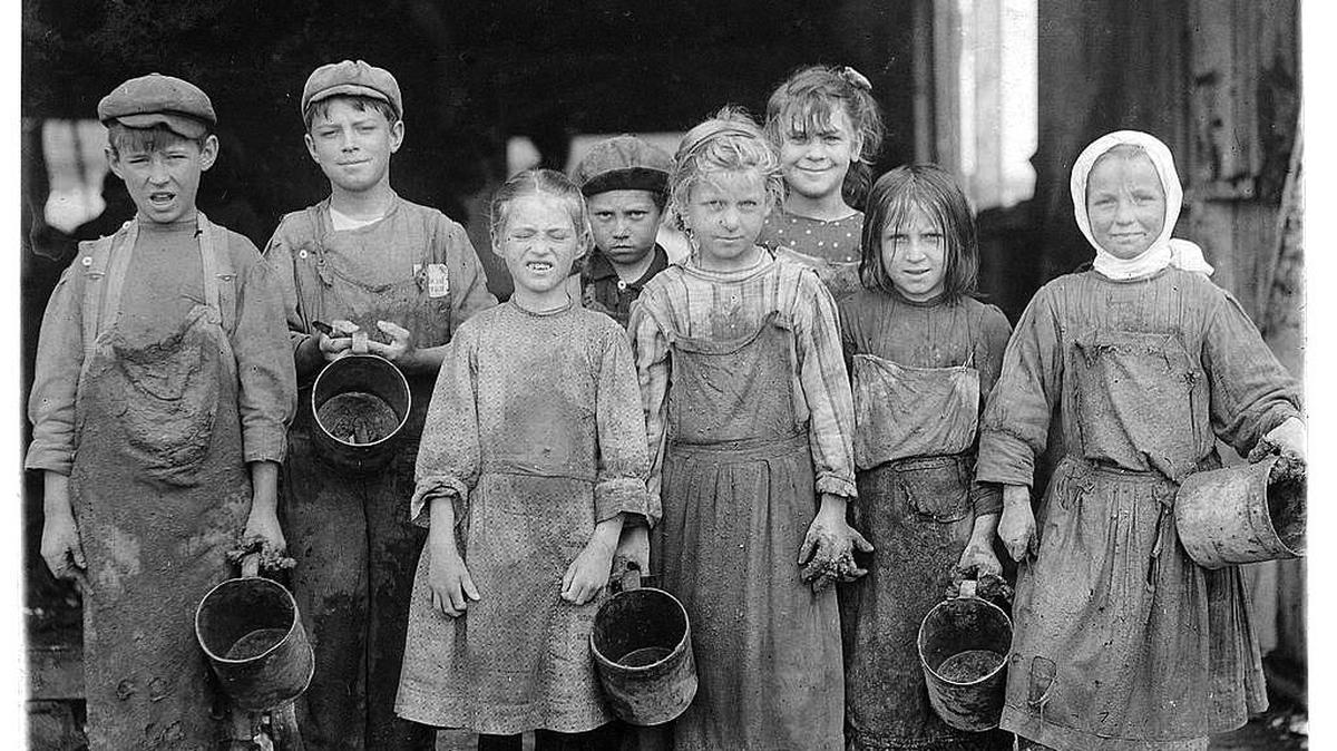 In this photo taken in February 1912 at the Maggioni Canning Co. in Port Royal, photographer Lewis Hine noted these children went to school for a half a day. But four hours before school and three hours after, the children shucked oysters. On Saturday, the children shucked from 4 a.m. to early afternoon.