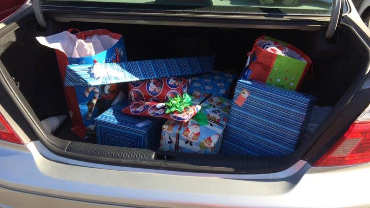 Janet Balmeceda's trunk full of Christmas presents for her 9-year-old son given to her by members of the Facebook page Bluffton/Hilton Head Ask and Answer.
