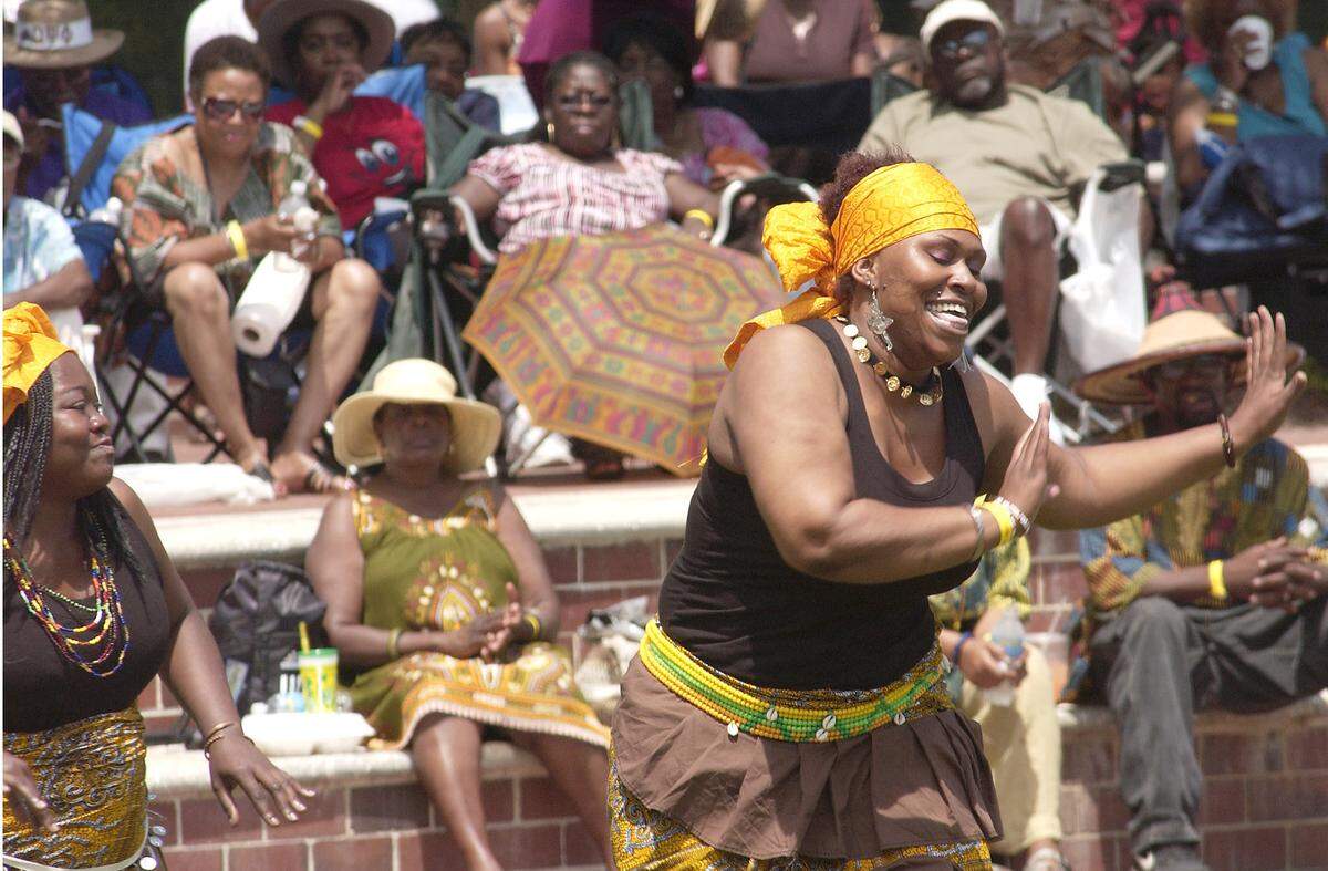 A member of the Yoruba Dancers, part of the Yoruba Drummers and Dancers from the Oyotunji African Village in Sheldon, entertained a large and enthusiastic crowd with an authentic African dance at the Gullah Festival Saturday at Beaufort’s Henry C. Chambers Waterfront Park.