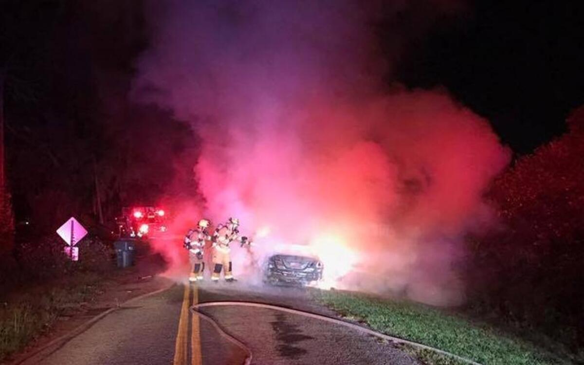 Firefighters with Beaufort-Port Royal Fire Department extinguish a vehicle fire in Polk Village early Sunday morning.